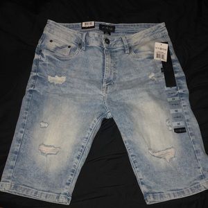 Light blue ripped jeans shorts